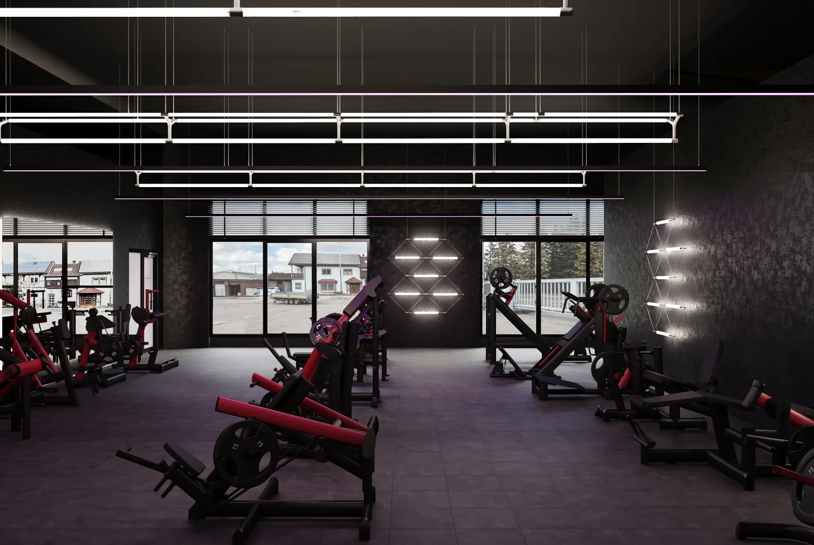Visualisierung des vorgesehenen Gym80 Plate-Loaded-Bereichs mit Trainingsgeräten und Hantelscheiben in Rot am See